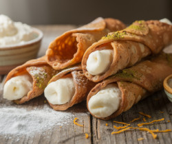 découvrez la recette authentique des cannoli siciliens : apprenez à préparer la coque croustillante et la délicieuse garniture à la ricotta pour un dessert italien traditionnel.