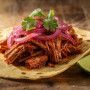 Cochinita pibil : le porc mariné à l&rsquo;achiote du Yucatán
